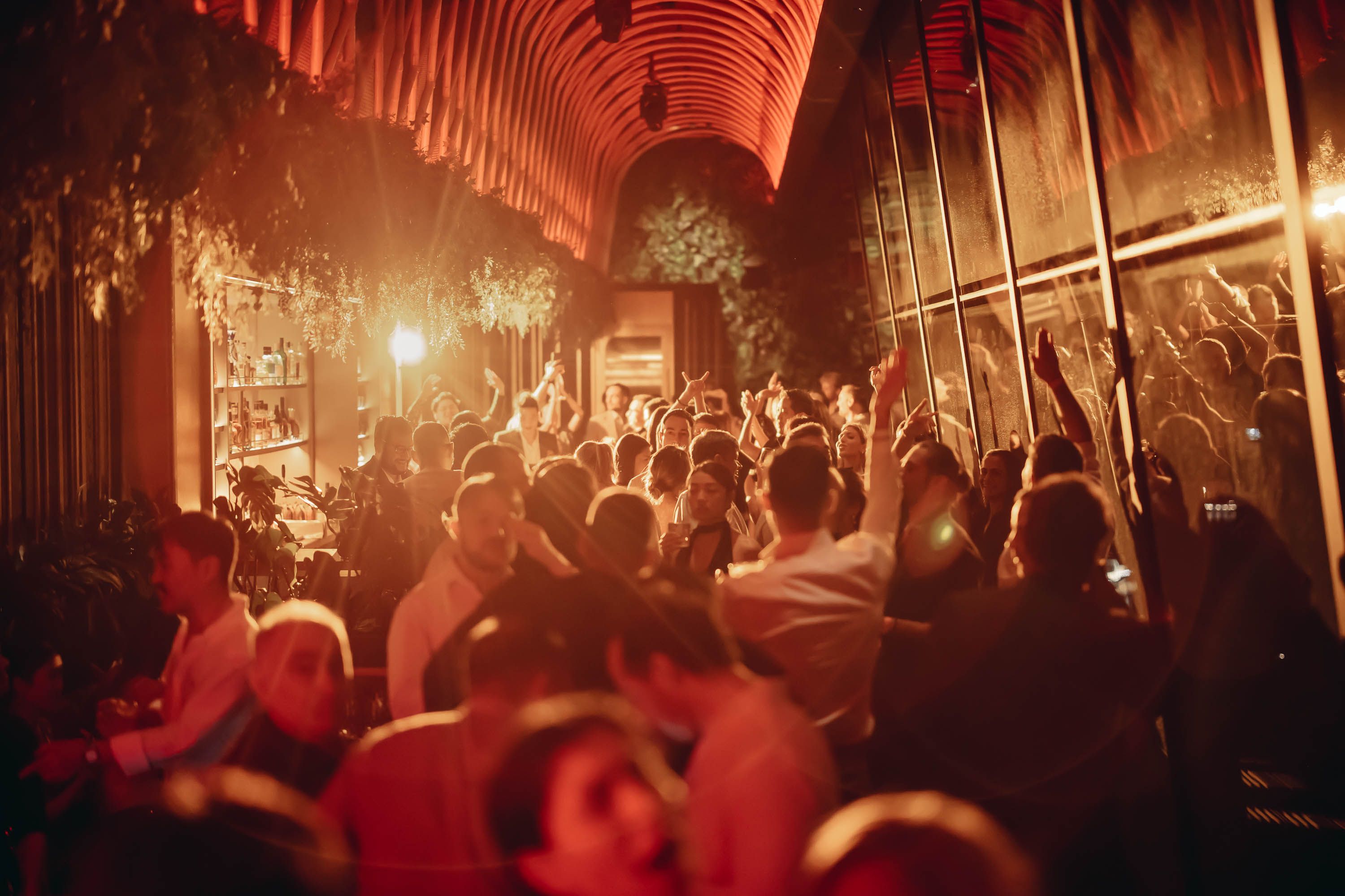 Halloween REDRUM Party at SUSHISAMBA Singapore with people dancing in the bar